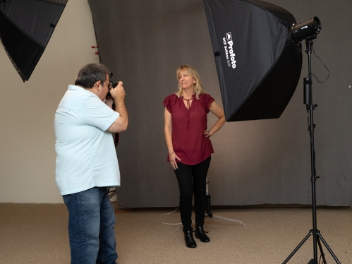 Jeff Arban taking a photo at R-Comm's Davidson Hall Studio